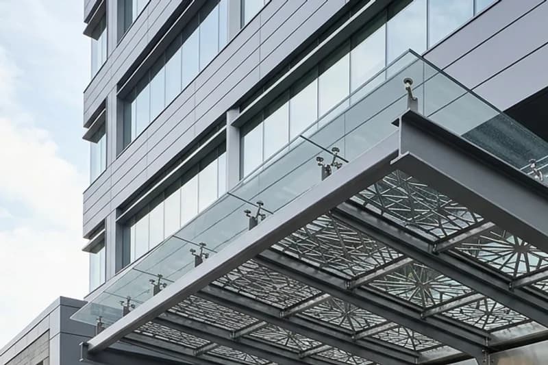 Parking garage structure drawing showing precast spandrel and cable barrier